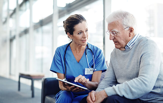 Doctor discusses therapeutic solutions with a patient