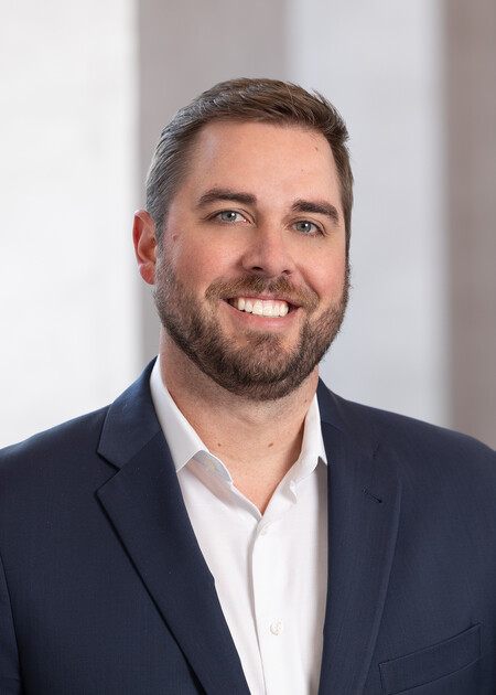 Headshot of John Grit